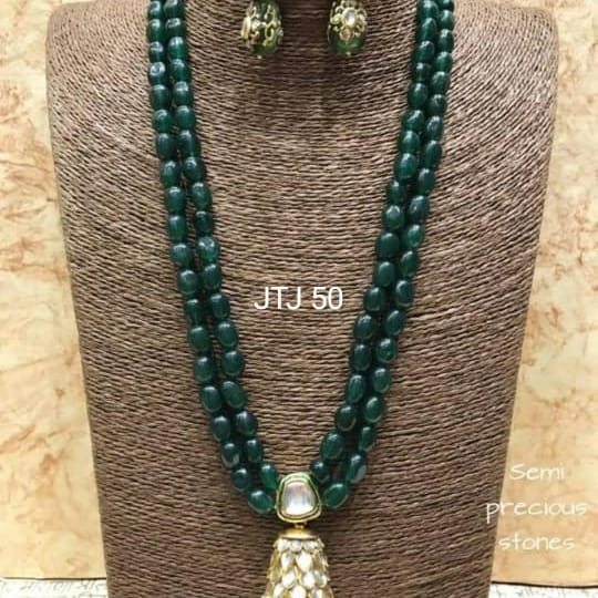 Emrald green mala with kundan pandent