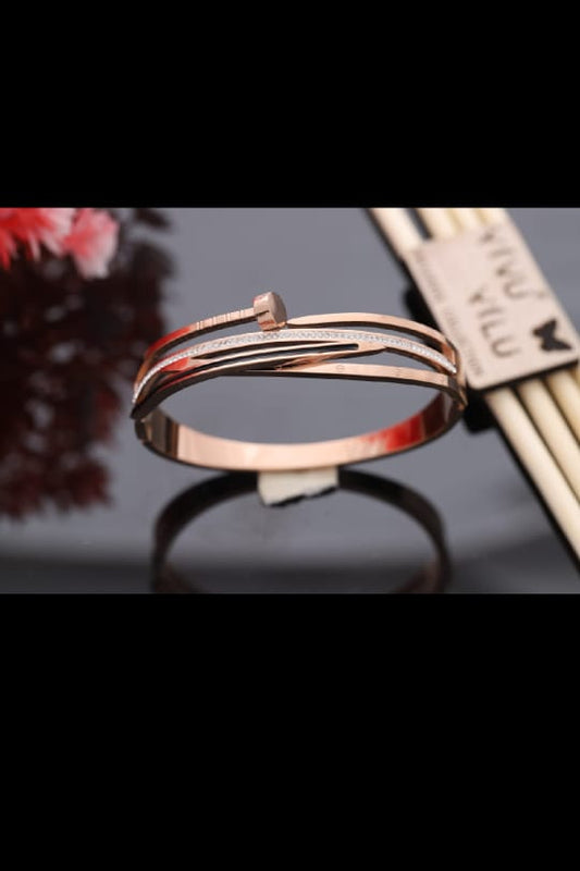 Ad studded rose gold brasslet